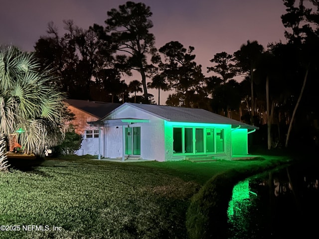 exterior space featuring a lawn