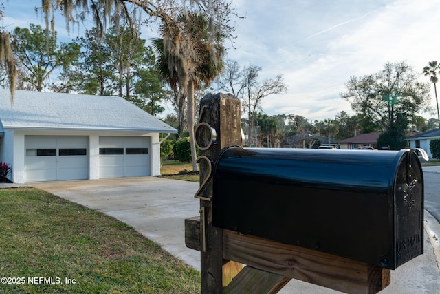 exterior space with a garage and an outdoor structure