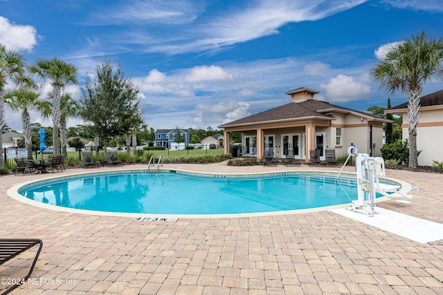 view of pool with a patio area