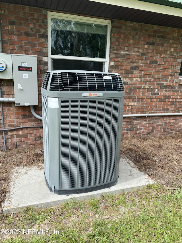 exterior details featuring cooling unit