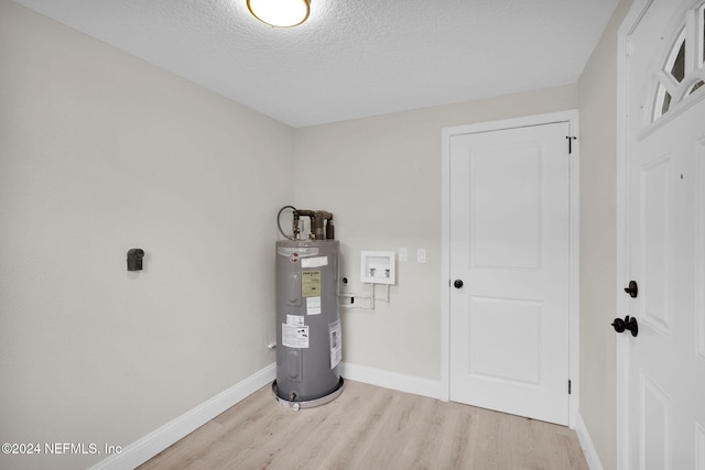 utility room with water heater