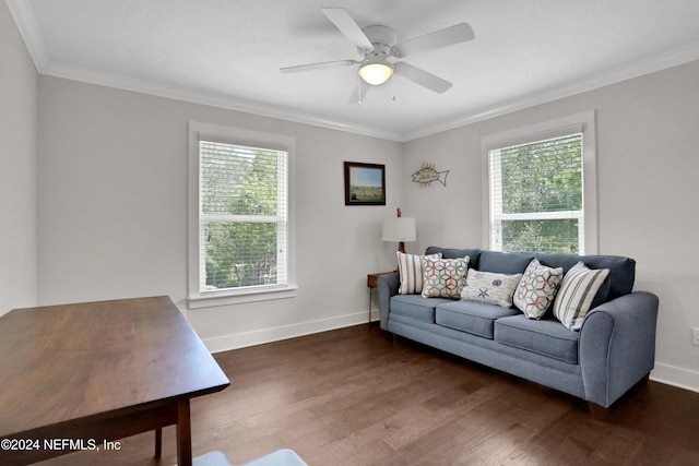 living room with ornamental molding, plenty of natural light, dark wood-type flooring, and ceiling fan