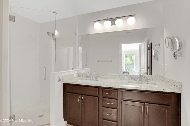 bathroom featuring vanity and walk in shower