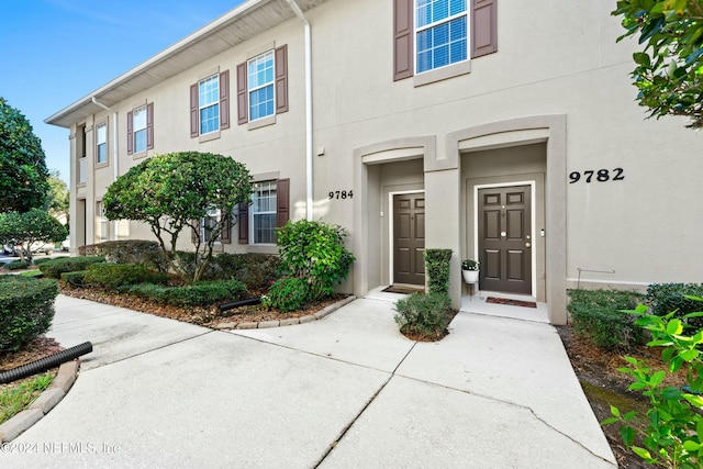 9782 Summer Grove Way W, Jacksonville, FL 32257 - view of front of property featuring stucco siding