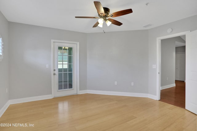 spare room with ceiling fan and light hardwood / wood-style floors