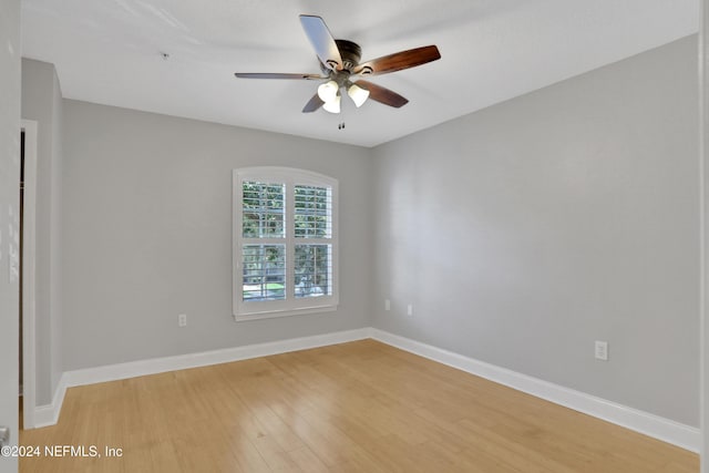 unfurnished room with ceiling fan and light wood-type flooring