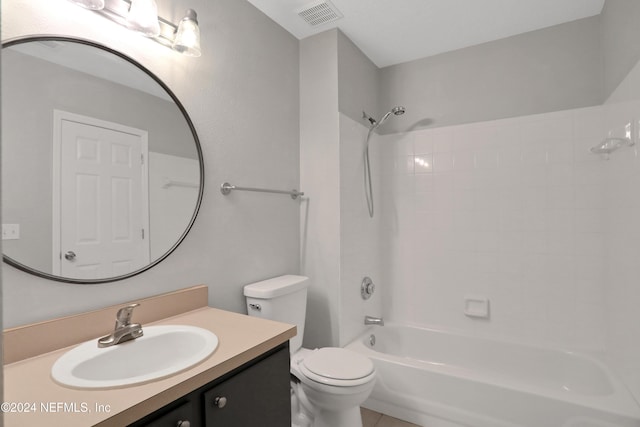 full bathroom featuring shower / bathing tub combination, vanity, and toilet