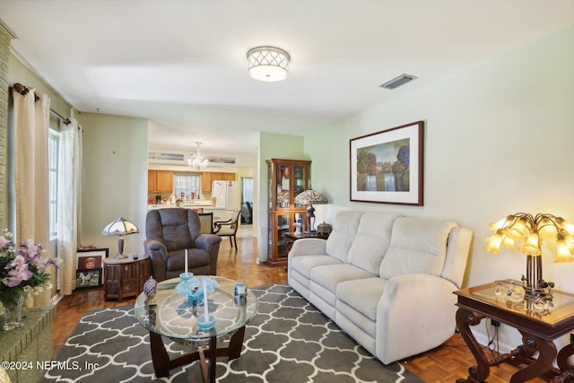 living room with dark parquet floors