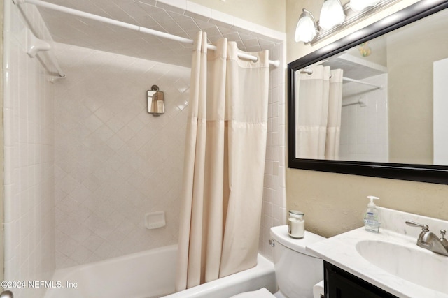 full bathroom featuring shower / bath combination with curtain, toilet, and vanity