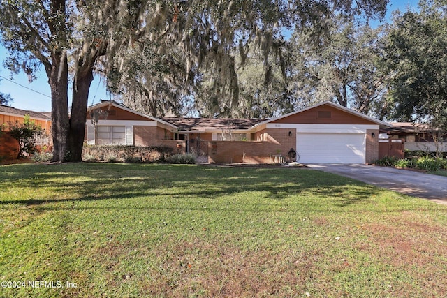 single story home with a garage and a front yard