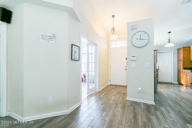 foyer with hardwood / wood-style flooring