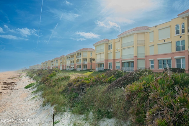 view of building exterior with a water view