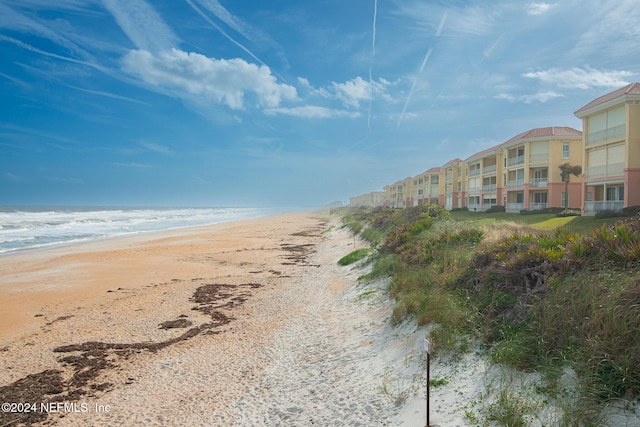 exterior space with a view of the beach and a water view