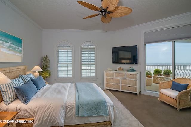 carpeted bedroom featuring a textured ceiling, ceiling fan, access to exterior, and crown molding