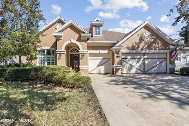 view of front of home featuring a garage