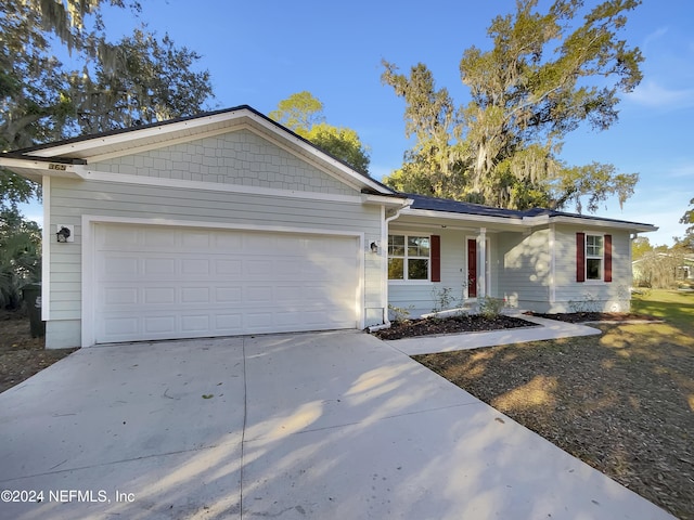 ranch-style home with a garage