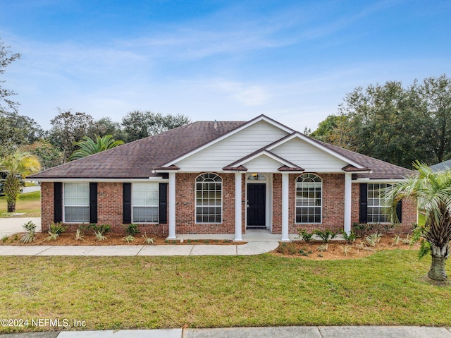 ranch-style house with a front yard