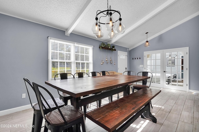 dining space featuring french doors, lofted ceiling with beams, a wealth of natural light, and a notable chandelier