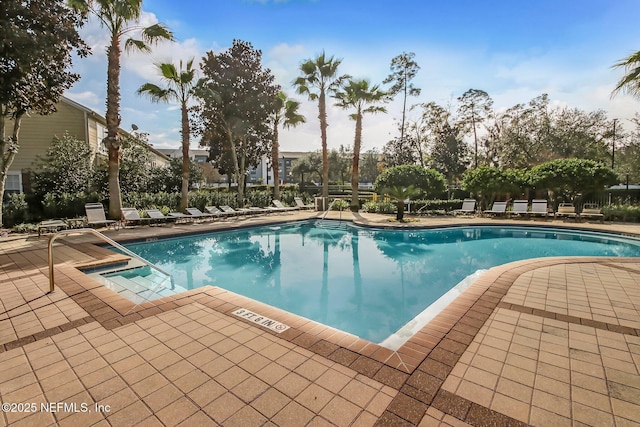 view of swimming pool featuring a patio