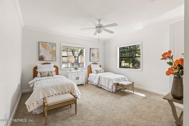 bedroom with baseboards, ornamental molding, a textured ceiling, and light colored carpet