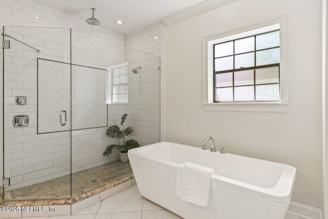 bathroom featuring a freestanding bath, marble finish floor, a stall shower, and recessed lighting