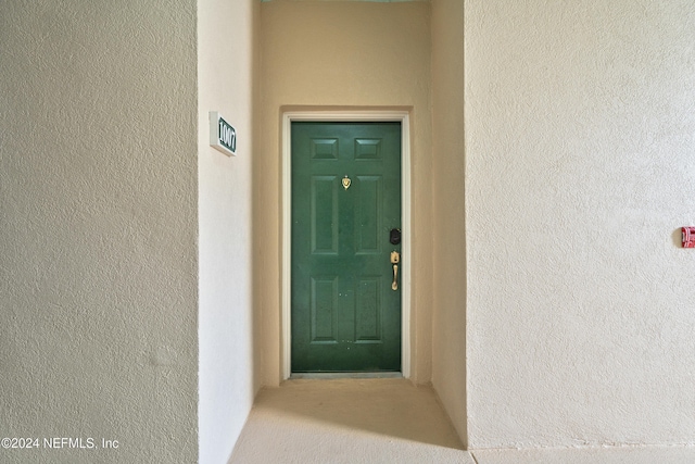8601 Beach Blvd Unit 1007, Jacksonville, FL 32216 - property entrance with stucco siding