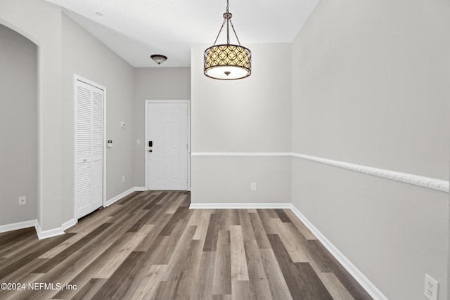 interior space with dark hardwood / wood-style floors