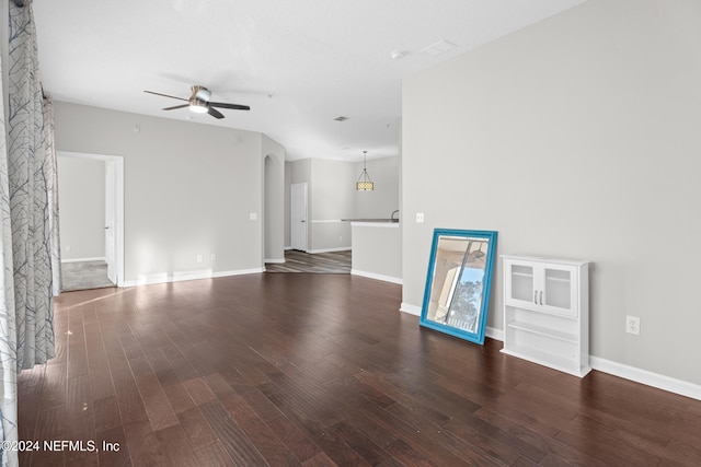 8601 Beach Blvd Unit 1007, Jacksonville, FL 32216 - unfurnished living room with ceiling fan, wood finished floors, and arched walkways