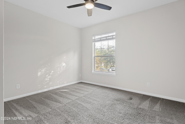 8601 Beach Blvd Unit 1007, Jacksonville, FL 32216 - unfurnished room with carpet and a ceiling fan