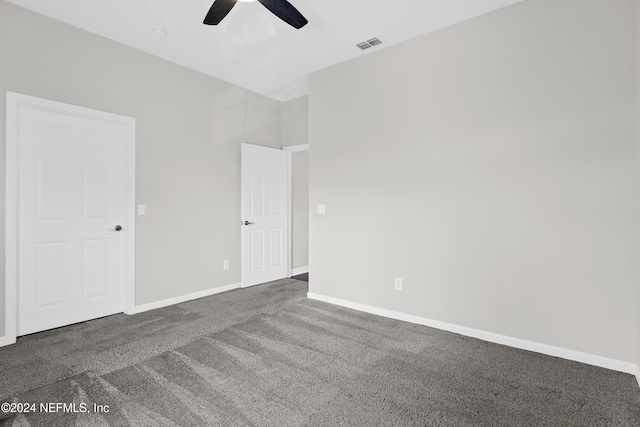 8601 Beach Blvd Unit 1007, Jacksonville, FL 32216 - unfurnished bedroom with carpet flooring and ceiling fan