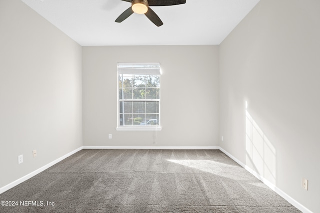 8601 Beach Blvd Unit 1007, Jacksonville, FL 32216 - empty room featuring ceiling fan and carpet