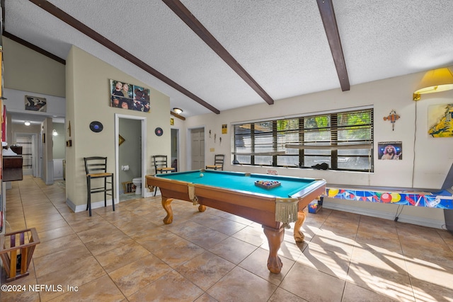 game room featuring a textured ceiling, beam ceiling, light tile patterned floors, high vaulted ceiling, and pool table