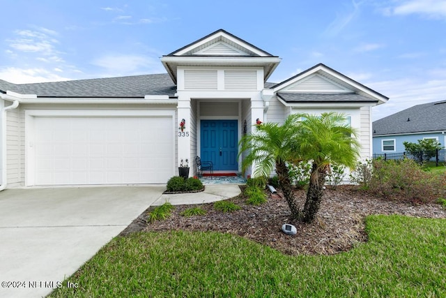 view of front of home with a garage