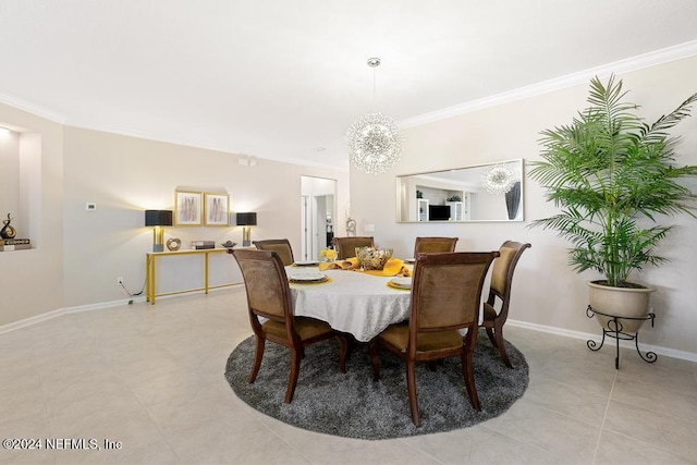 dining area featuring a chandelier, crown molding, and light tile patterned flooring