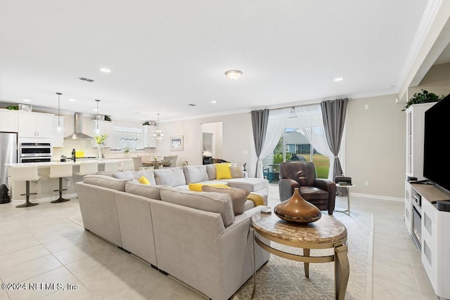 living room with crown molding and light tile patterned floors