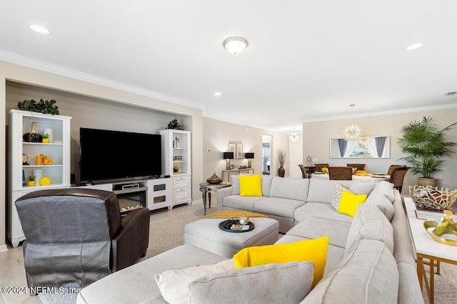 living room with crown molding and a fireplace