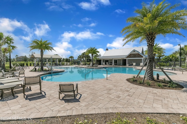 view of pool with a patio area