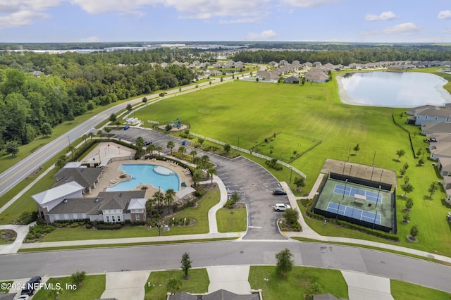 bird's eye view with a water view and a residential view