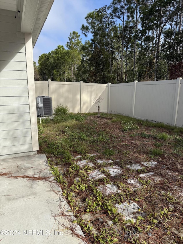 view of yard featuring cooling unit