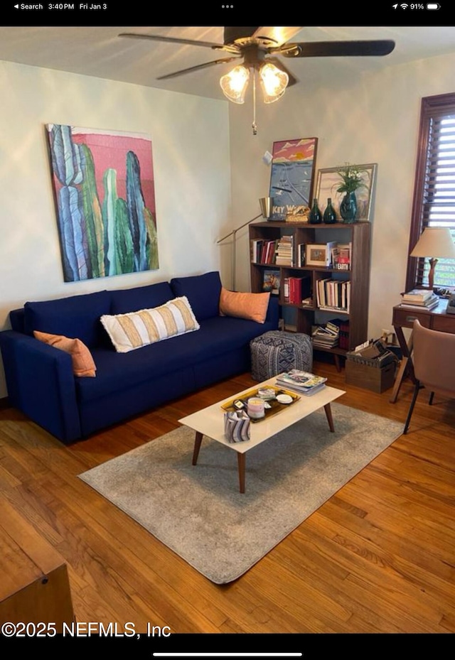 living room with wood-type flooring