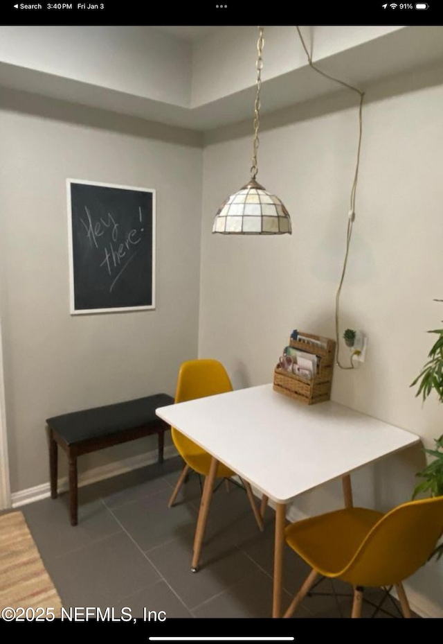 view of tiled dining space