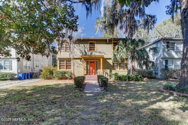 view of front facade with a front lawn