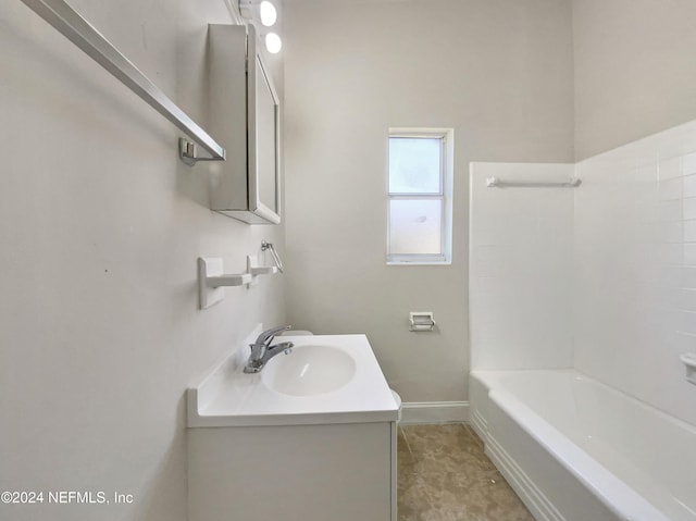 bathroom featuring shower / bathing tub combination and vanity