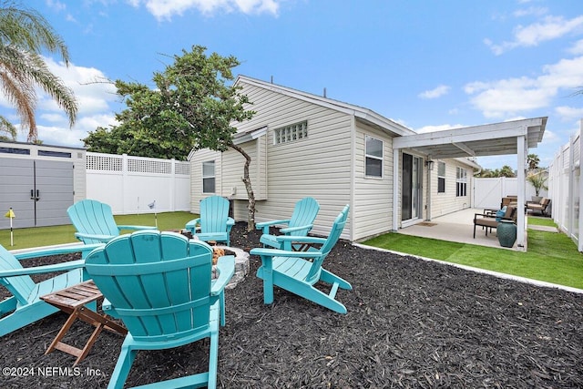 rear view of property with a patio area