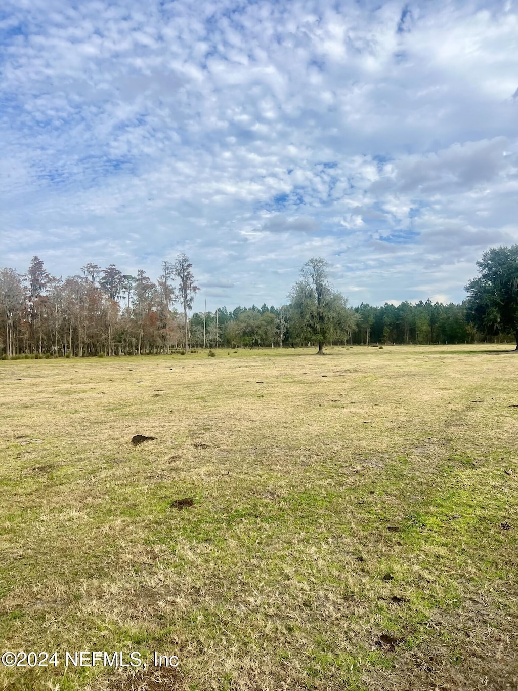 exterior space with a rural view