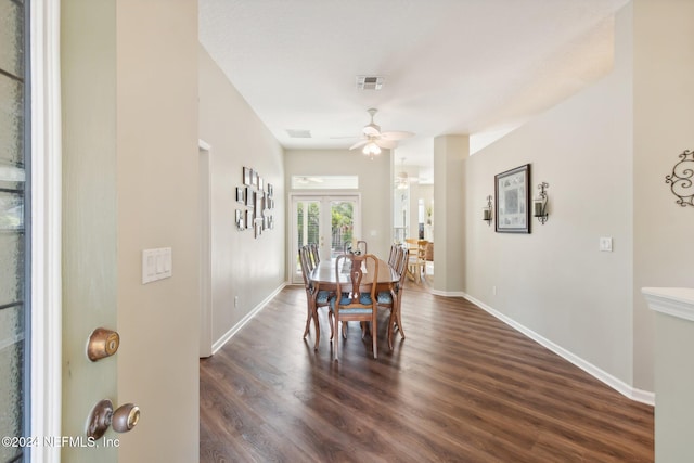 dining space with french doors, dark hardwood / wood-style floors, and ceiling fan