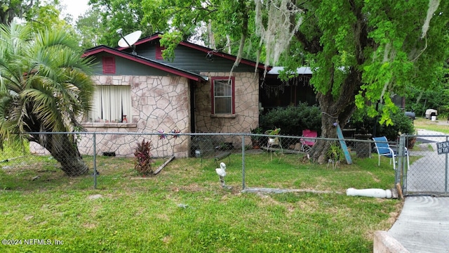 view of side of home featuring a yard