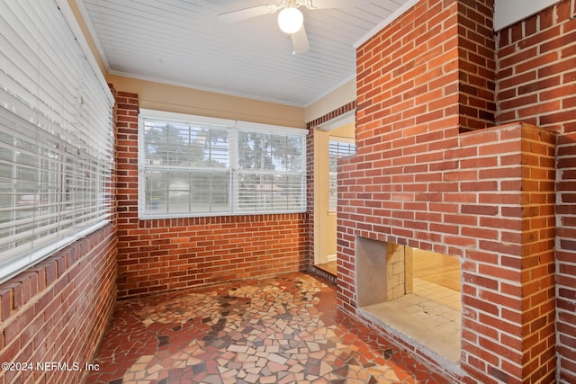 unfurnished sunroom featuring wood ceiling