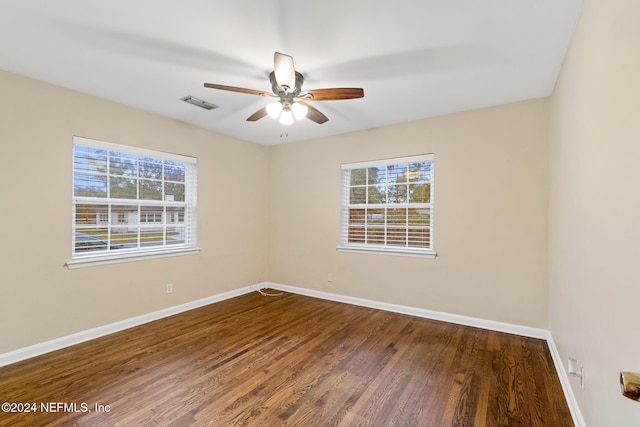 unfurnished room featuring hardwood / wood-style floors