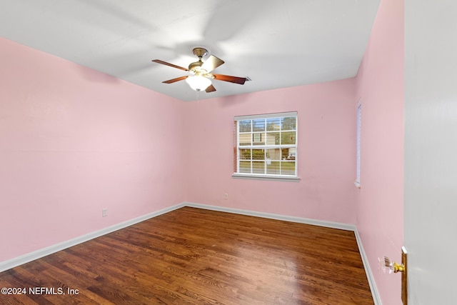 spare room with wood-type flooring and ceiling fan